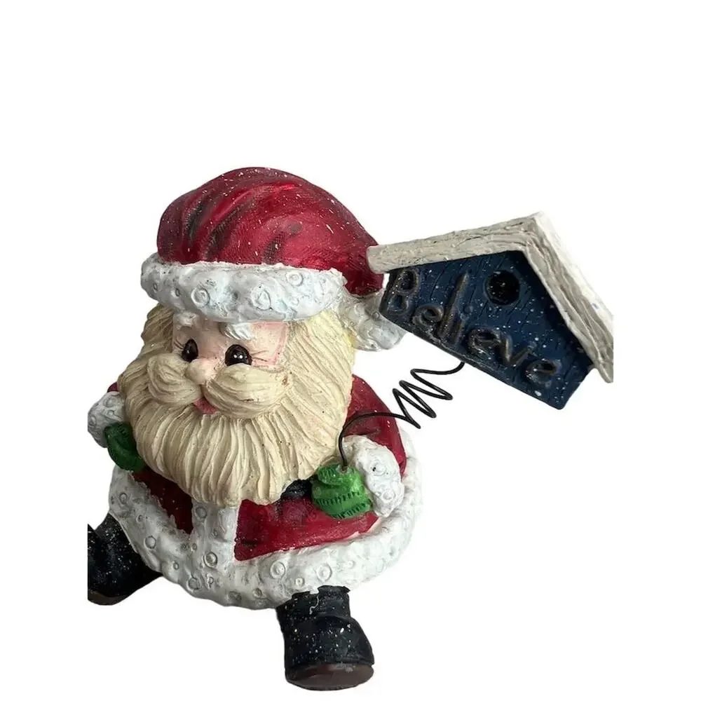 A Berry Merry Christmas Santa Claus Figurine 3